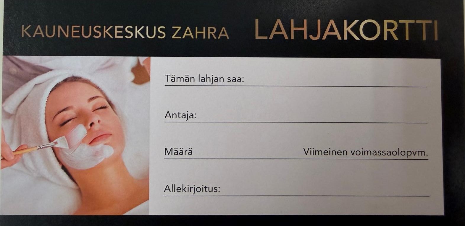 Kauneuskeskus Zahran musta lahjakortti kultaisella tekstillä